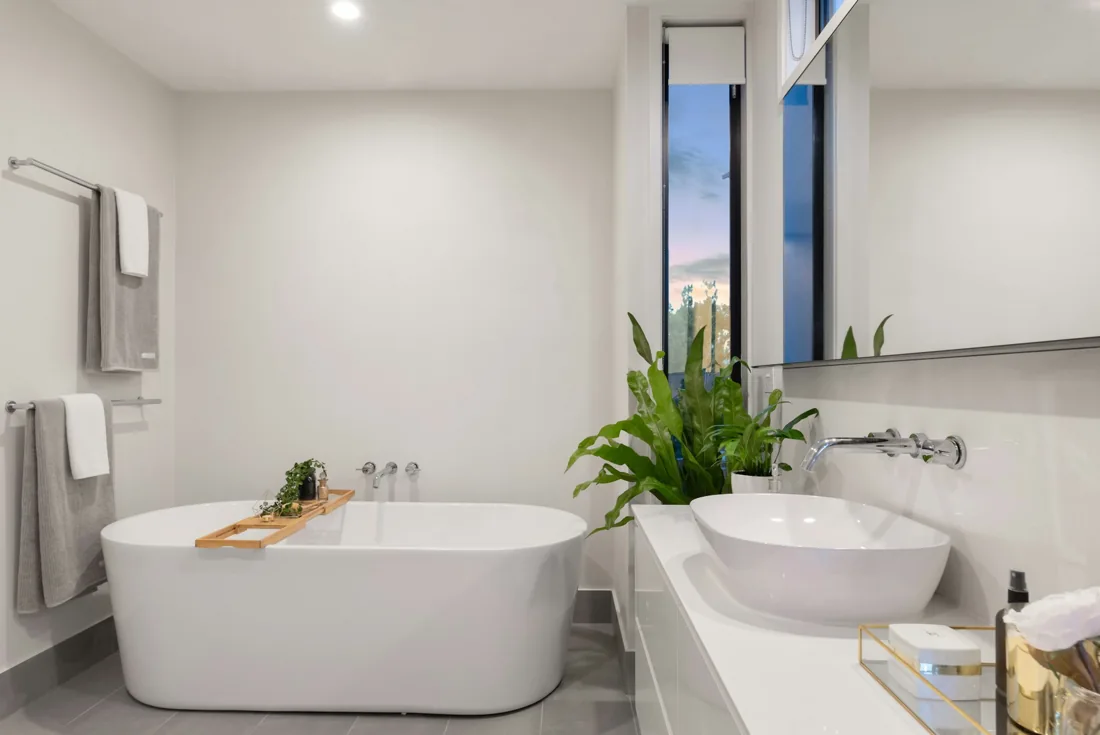 Bright bathroom with a freestanding bath and natural light